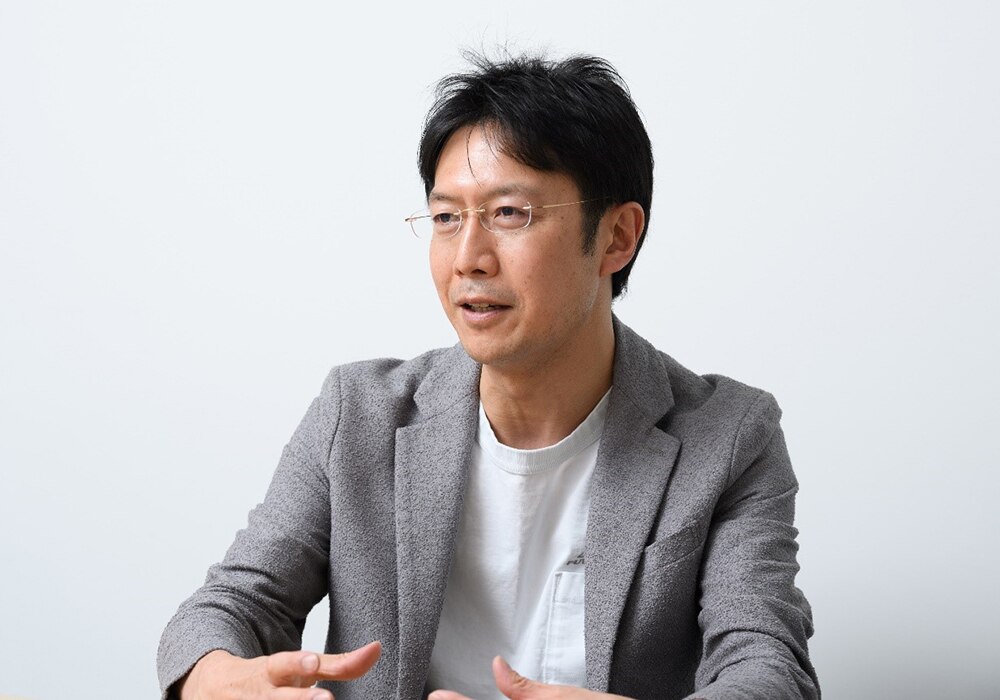 株式会社クレディセゾン 取締役 兼 専務執行役員 CTO 兼 CIO全社DX戦略推進 デジタルイノベーション事業部 管掌 小野 和俊 様の写真