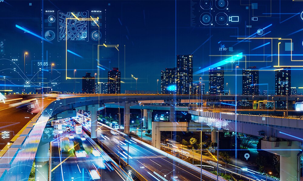 夜景の都市環境を背景にした交通システムの先進的なビジョン